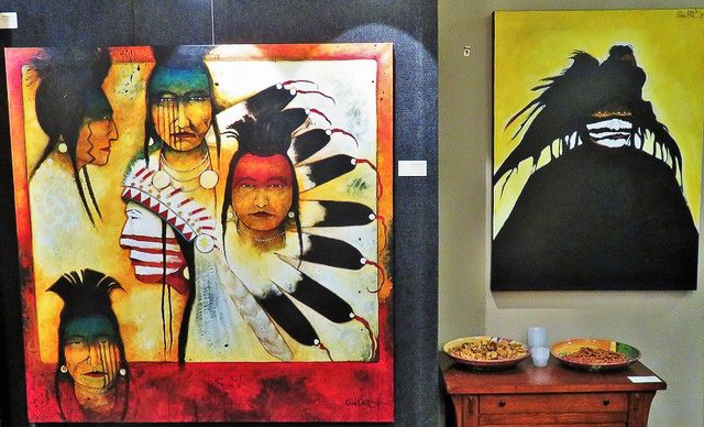 A small white dog in a stroller outside a clothing store.