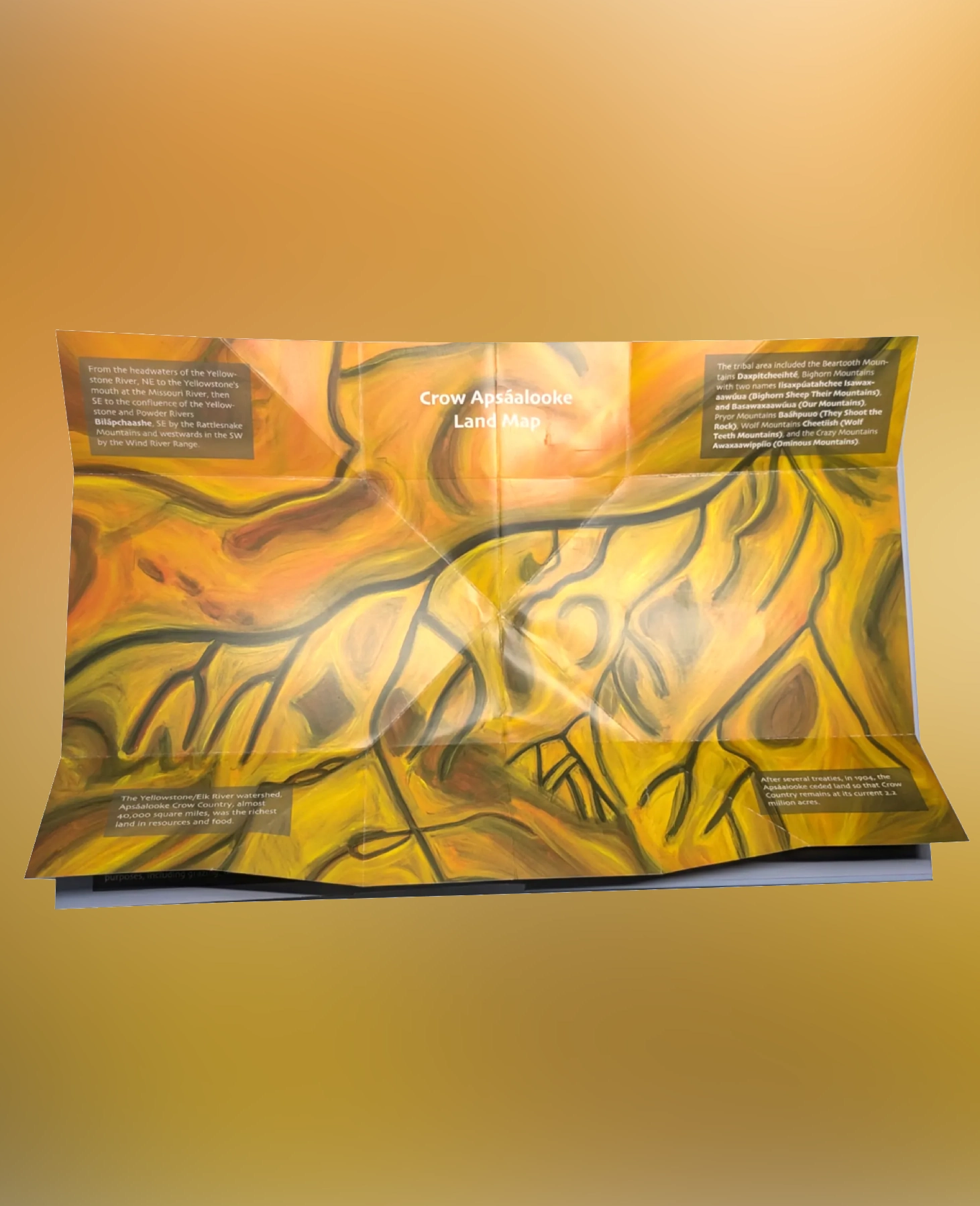 Abstract yellow and orange painting on a canvas.