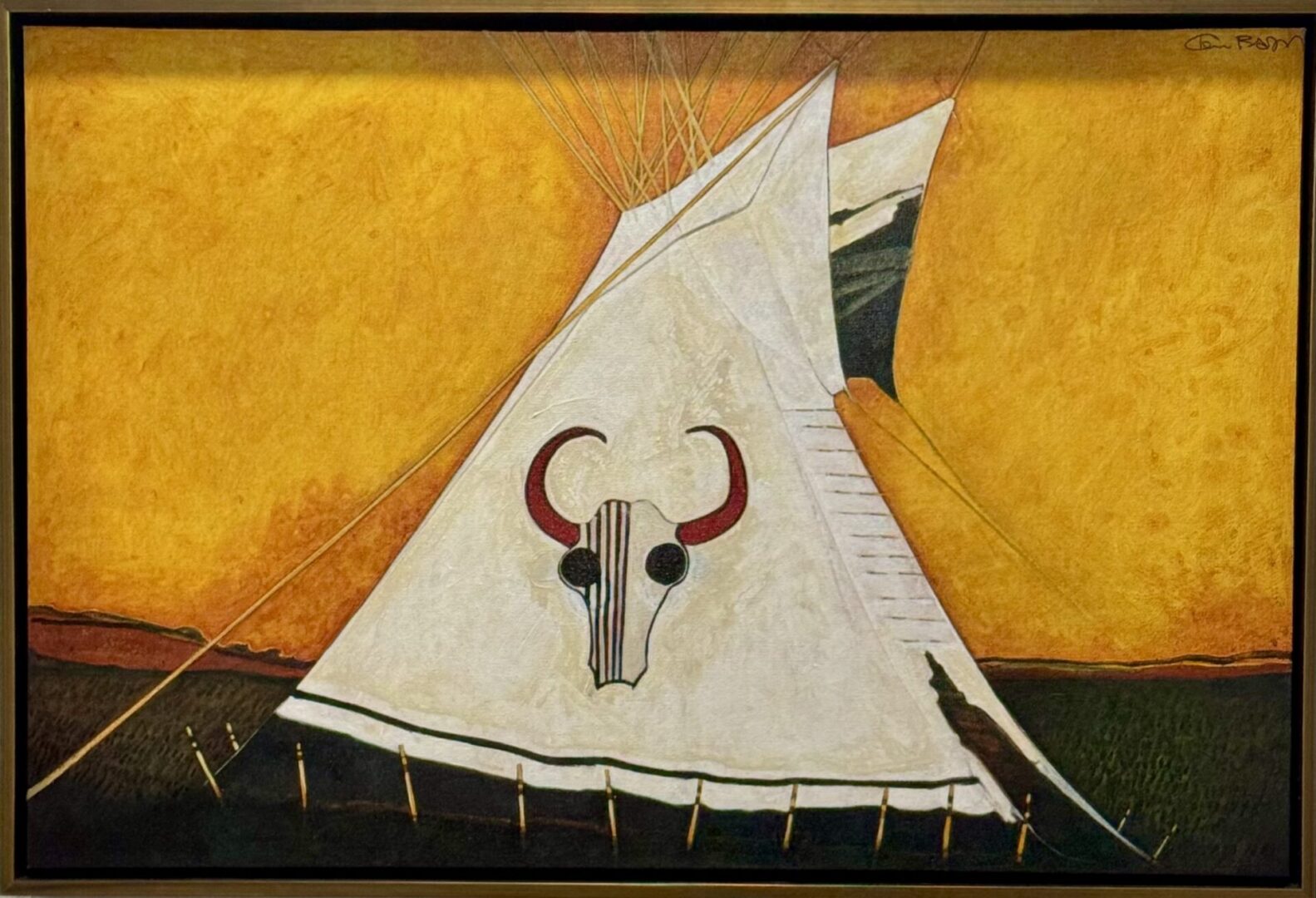A stylized painting of a teepee with a buffalo skull design against a golden background.