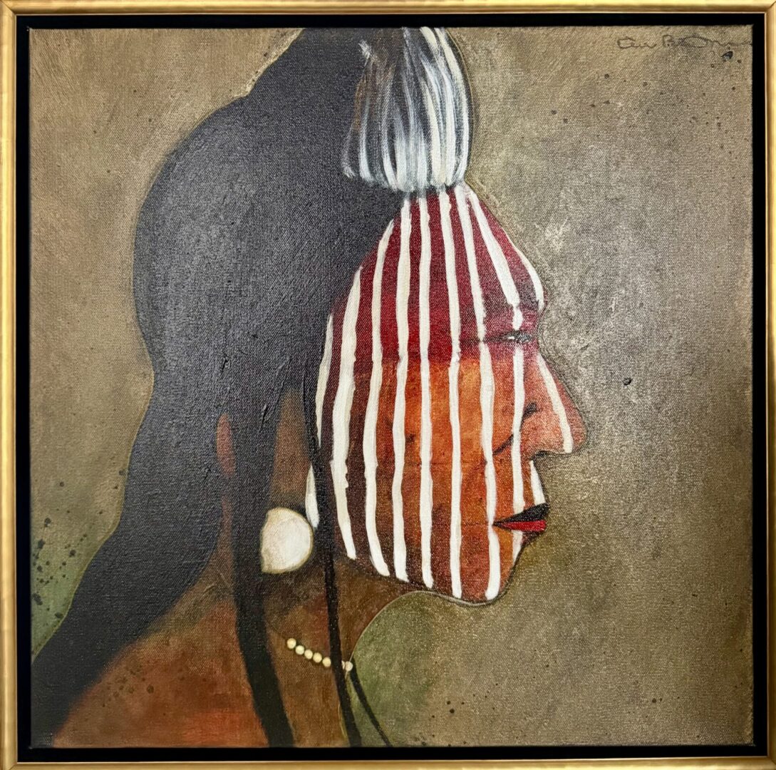 Profile of a Native American with traditional face paint and adornments.