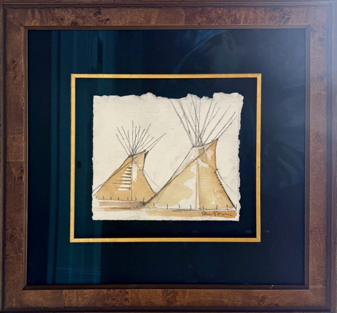 Framed artwork of two Native American teepees on textured paper.