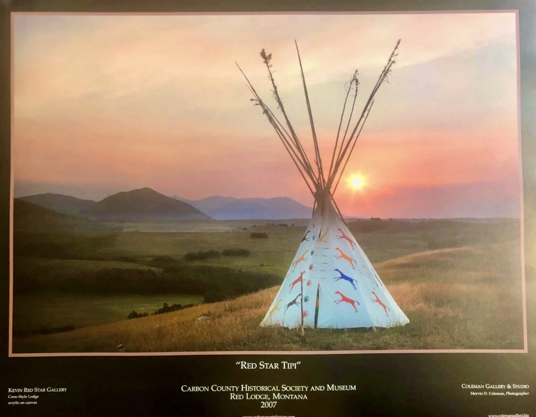 Tipi painted with colorful animals at sunset in Montana.