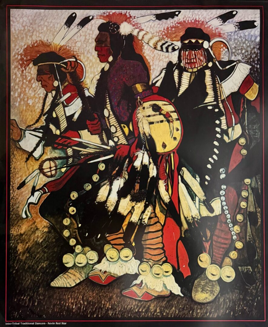 Three Native American dancers in traditional regalia with feathers and intricate beadwork.