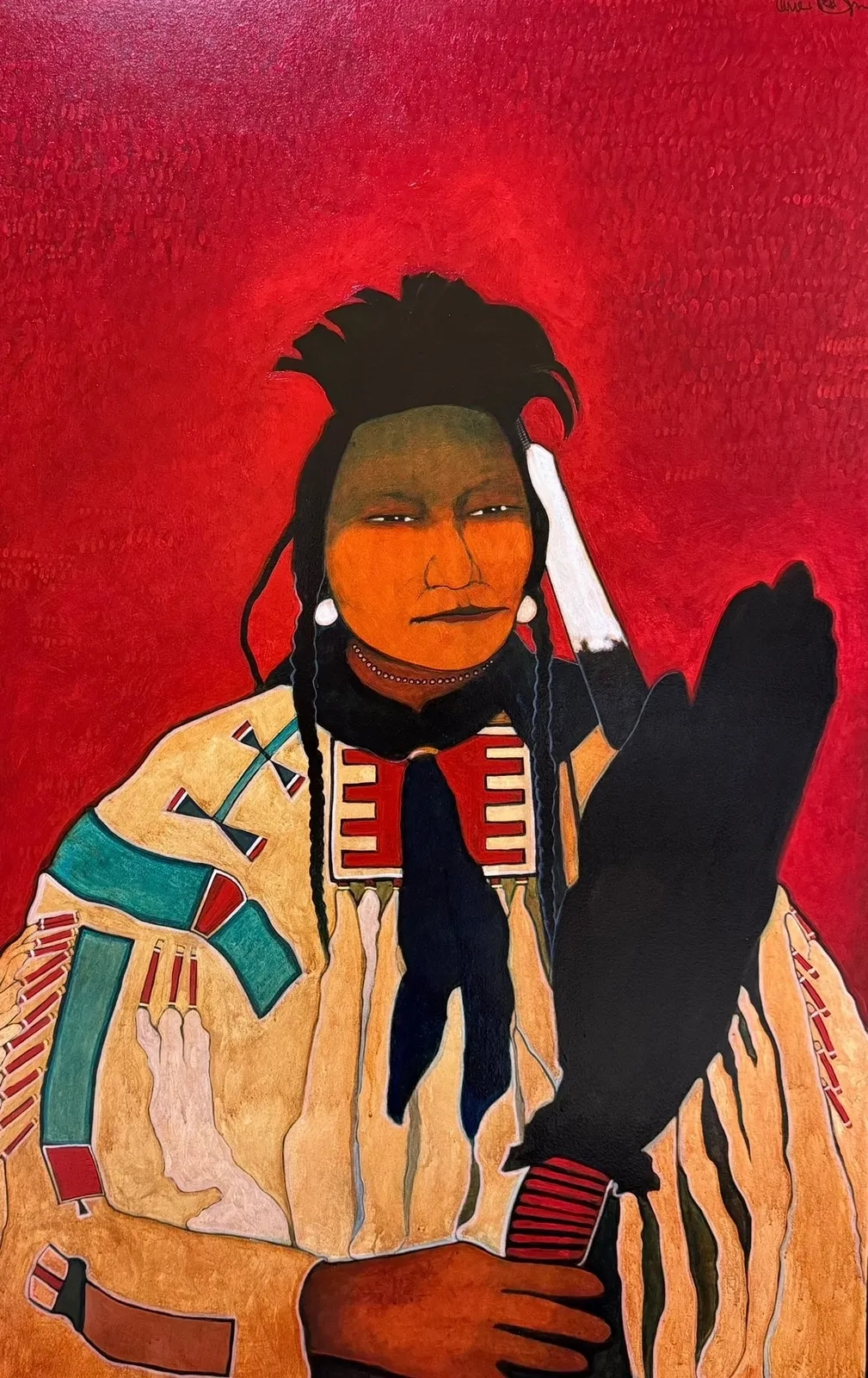 Portrait of a Native American man in traditional attire against a red background.