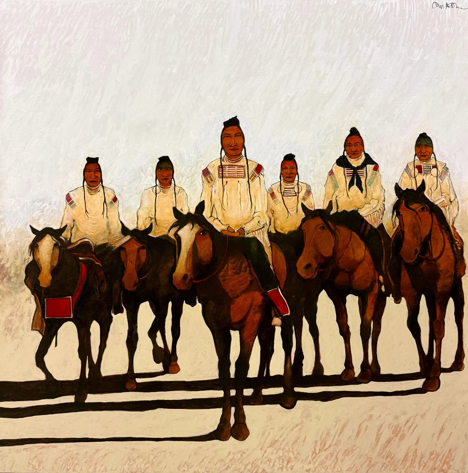 Seven Native American riders on horses in traditional attire.