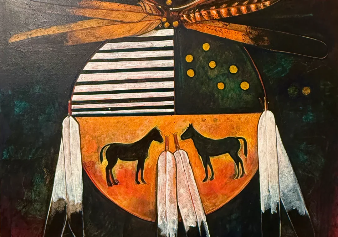 A Native American-inspired shield with horses and feathers.