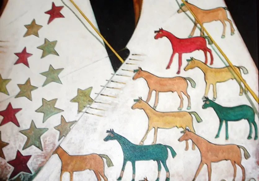 Painted teepees featuring stars and horses